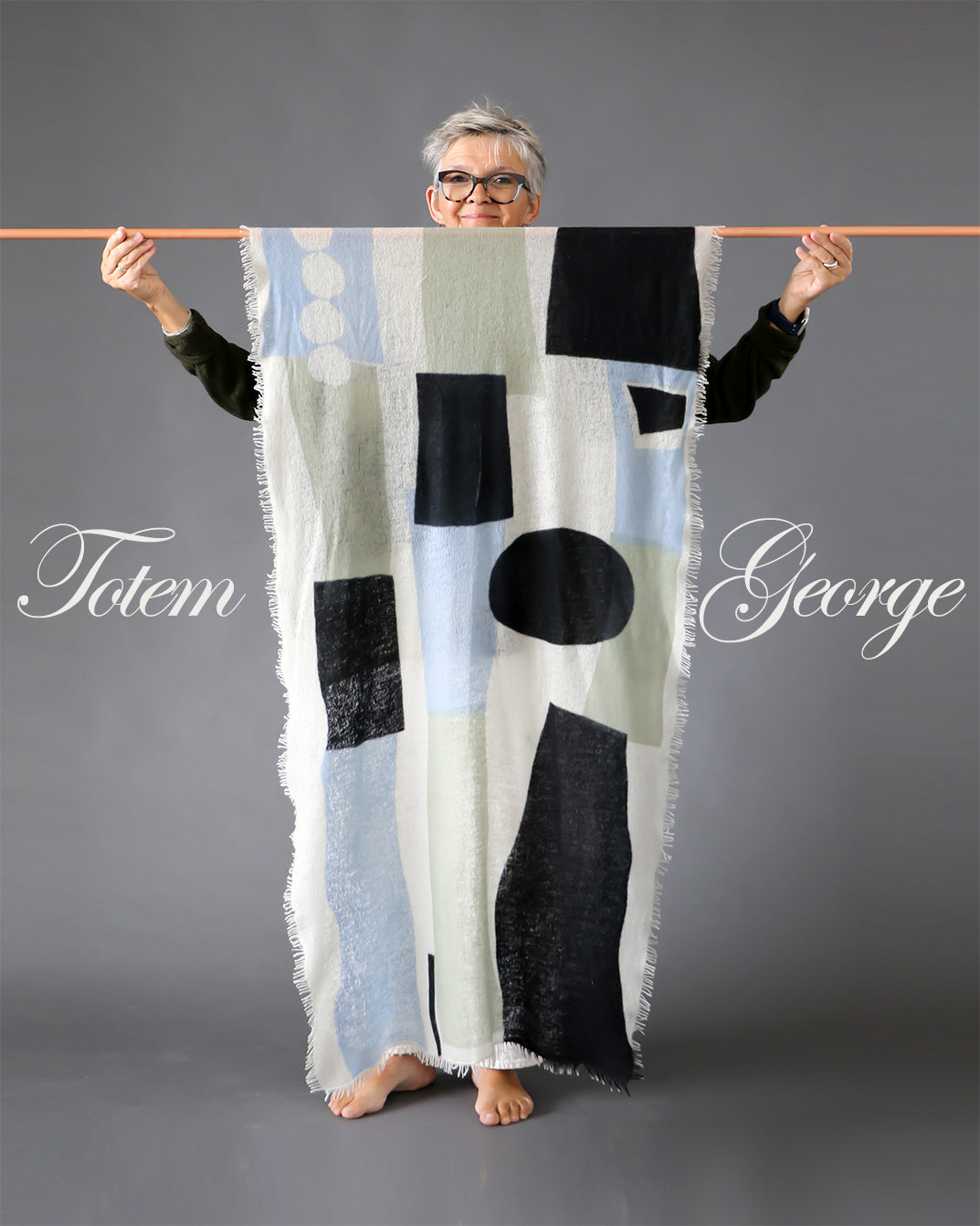 Large knitted cashmere scarf printed with an single abstract PilgrimWaters design called Totem Goerge.