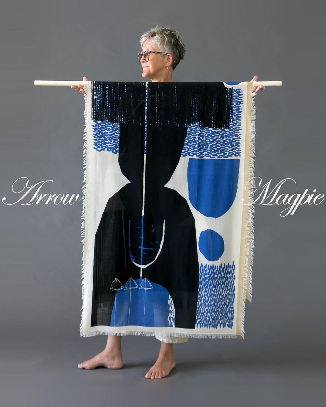 Large Wool/Silk scarf printed with a single abstract placement print called Arrow Magpie. Limited artisanal small batch production designed by PilgrimWaters.