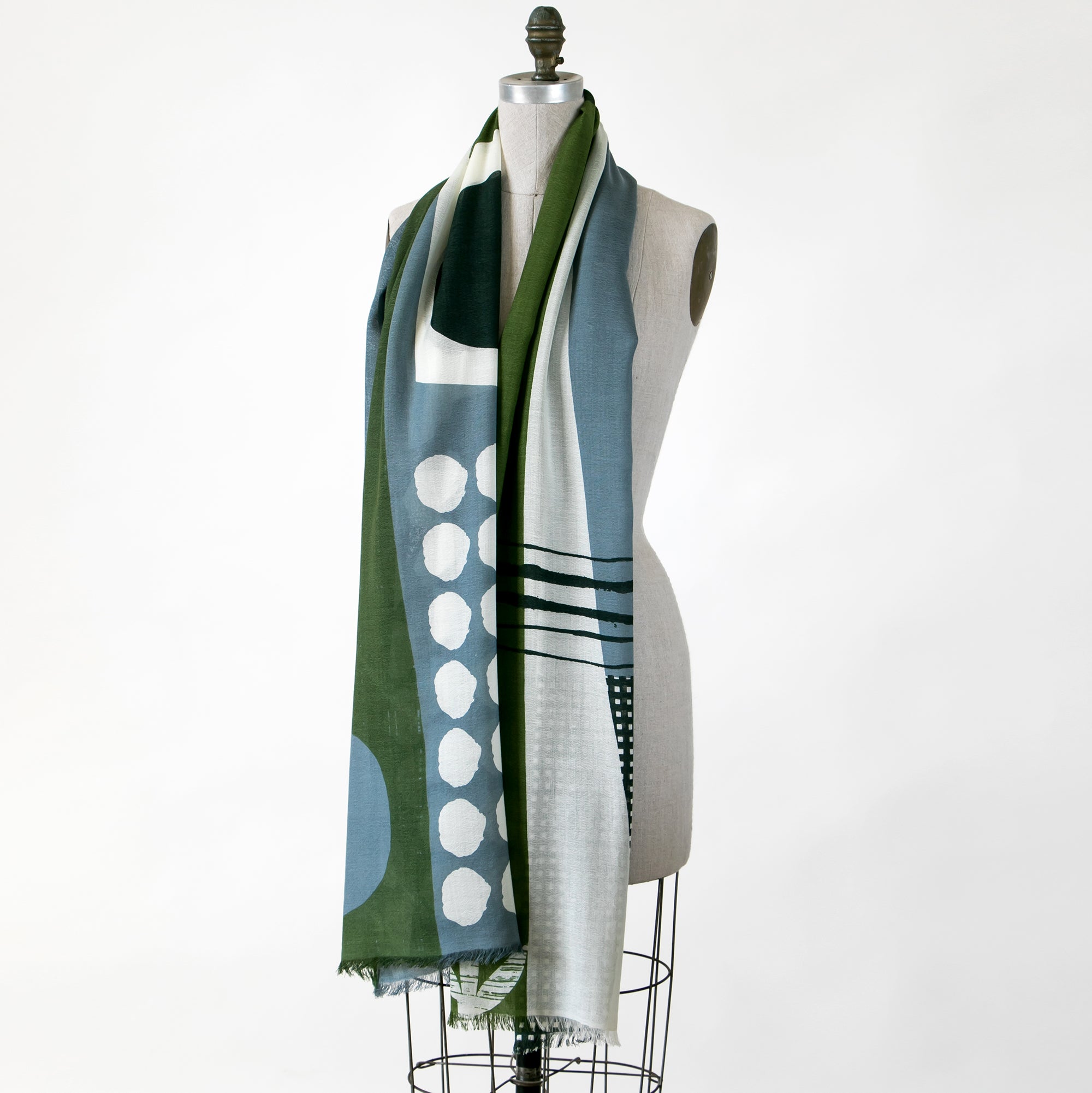 Banjo Olive scarf on a mannequin