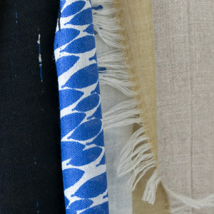 Close-up of Arrow wool silk scarf by PilgrimWaters with abstract print and four-sided fringe.