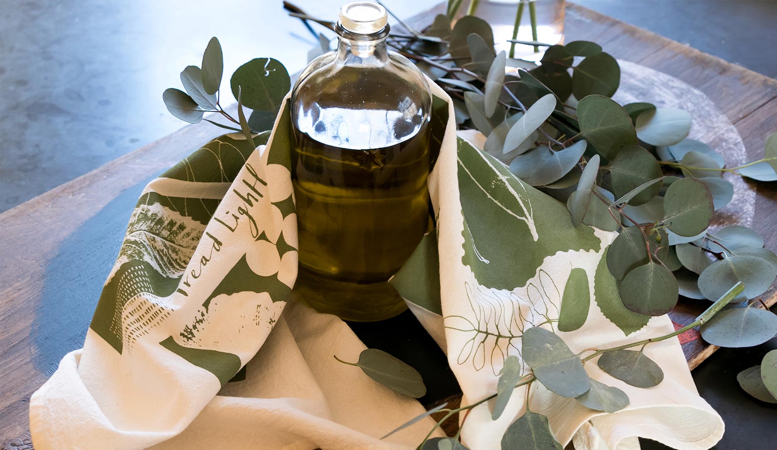 Leaves tea towel designed by PilgrimWaters with the words tread lightly made in the USA