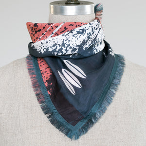 Cotton Silk Mini square bandana neck scarf Cups Indigo with indigo edges tied on a mannequin.