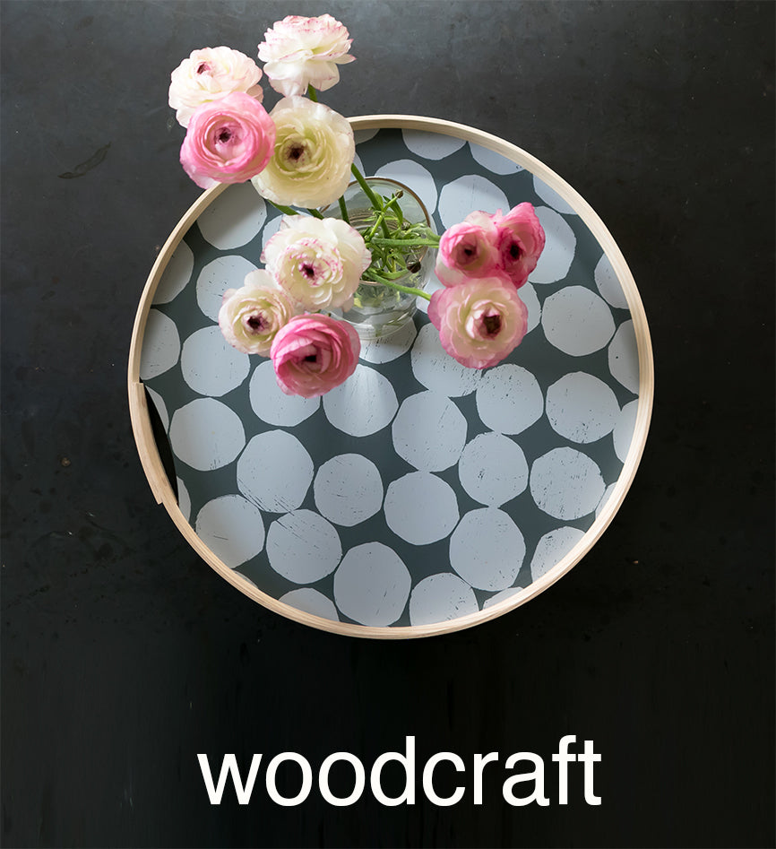 Round handprinted 18" tray handprinted with PilgrimWaters dot pattern gray-on-gray. Bounded with an ash wood band and secured with oak wood pins.