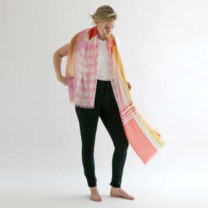 Banjo Jolly large merino wool scarf draped  on model a colorful abstract design handprinted in Nepal © 2026 PilgrimWaters.