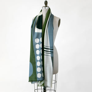 Banjo Olive, a large merino wool scarf draped on a mannequin — abstract print handprinted in Nepal, for PilgrimWaters.