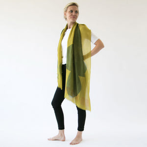 Boulder Moss Merino Wool scarf designed by Susy Pilgrim Waters styled on a model.