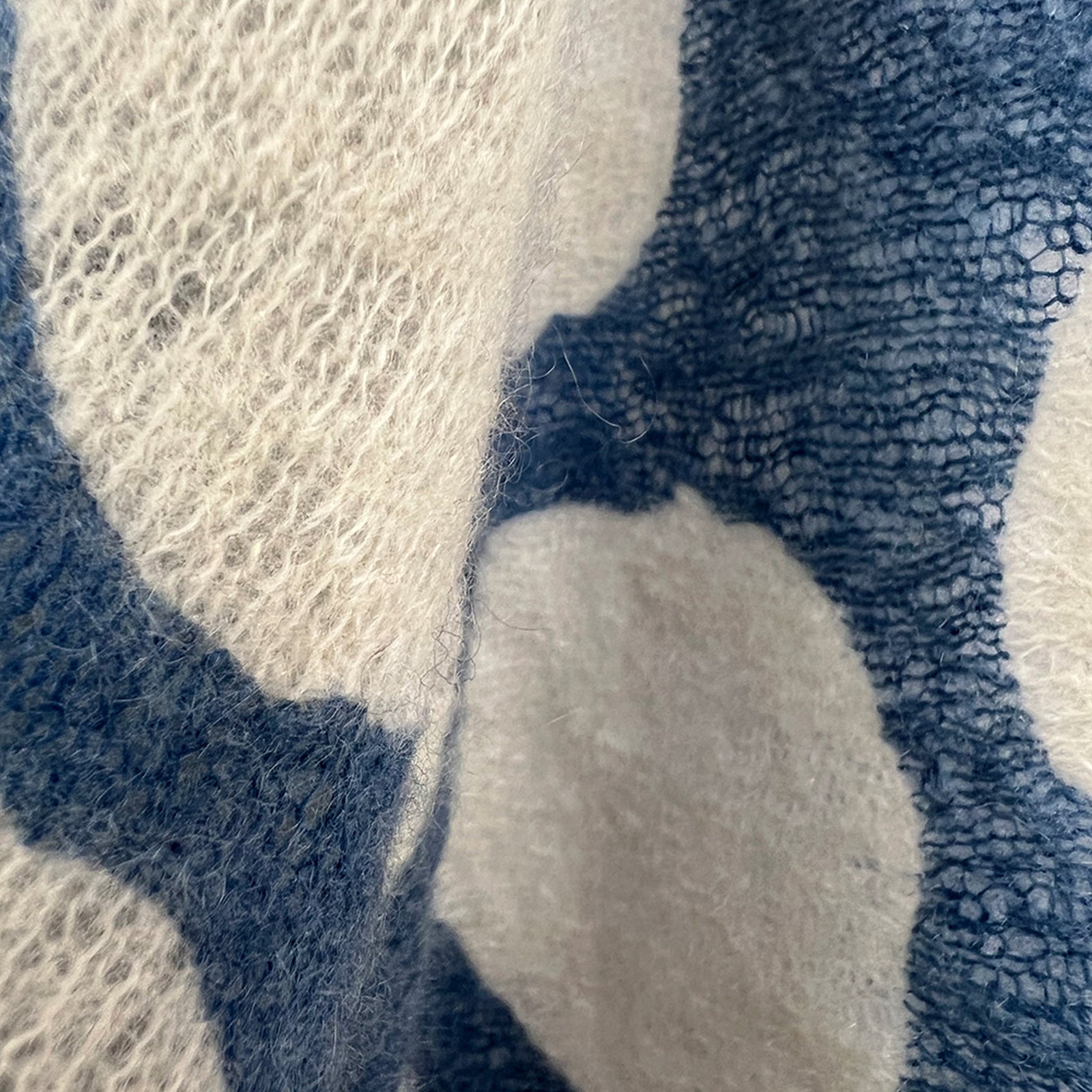 Close-up of a person wearing a 100% Cashmere Banjo Haze scarf.