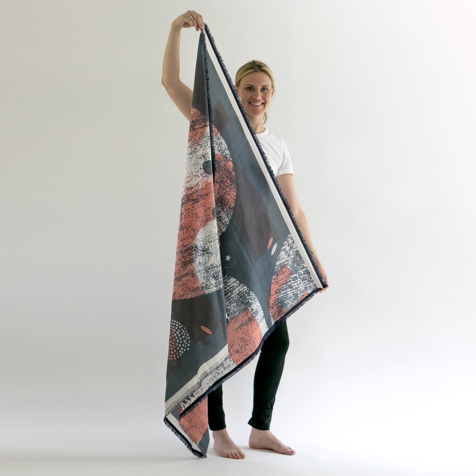 Large Cotton/Silk Cups Indigo scarf with sari edges held diagonally by model.
