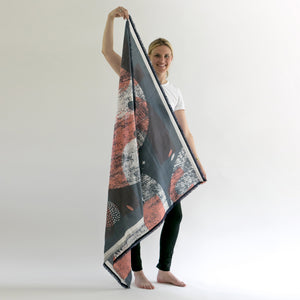 Large Cotton/Silk Cups Indigo scarf with sari edges held diagonally by model.