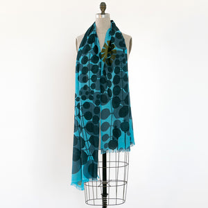 Echo Escape merino wool scarf on mannequin — abstract botanical print by PilgrimWaters, handmade in Nepal