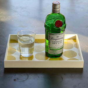 Orchre Mini Valet tray with Tanqueray gin bottle and glass on a table. Made in Gloucester, MA.