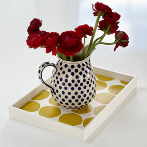 PilgrimWaters Mini color Valet tray with a polkadot vase with red roses on a white tabletop. Made in Gloucester, MA.
