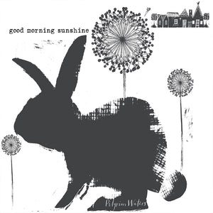 Tea towel Bunny design in dark navy with the words "Good morning sunshine". Copyright PilgrimWaters 2026.
