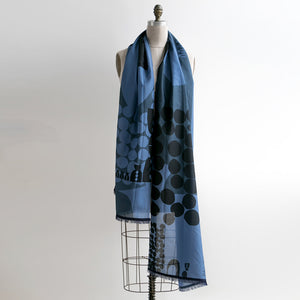 Trade Indigo Cotton/Silk long scarf draped on a mannequin.
