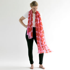 Model wearing Poppy design 100% Merino Wool scarf.