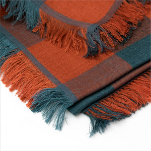 Gingham Spicy large scarf close-up showing the colorful soft edges.