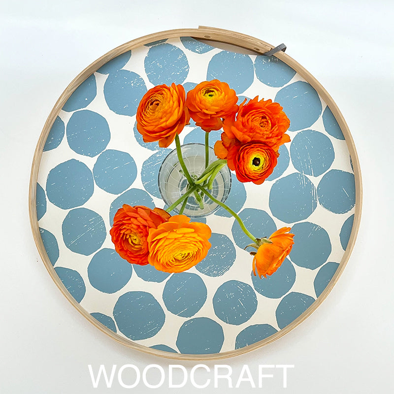 round tray printed with a sky design