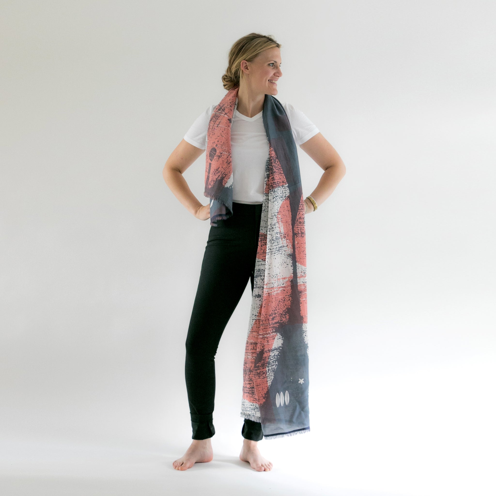 Discover the versatility of our Monogram Scarf Series, available