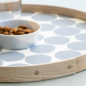 Round tray gray on white closeup